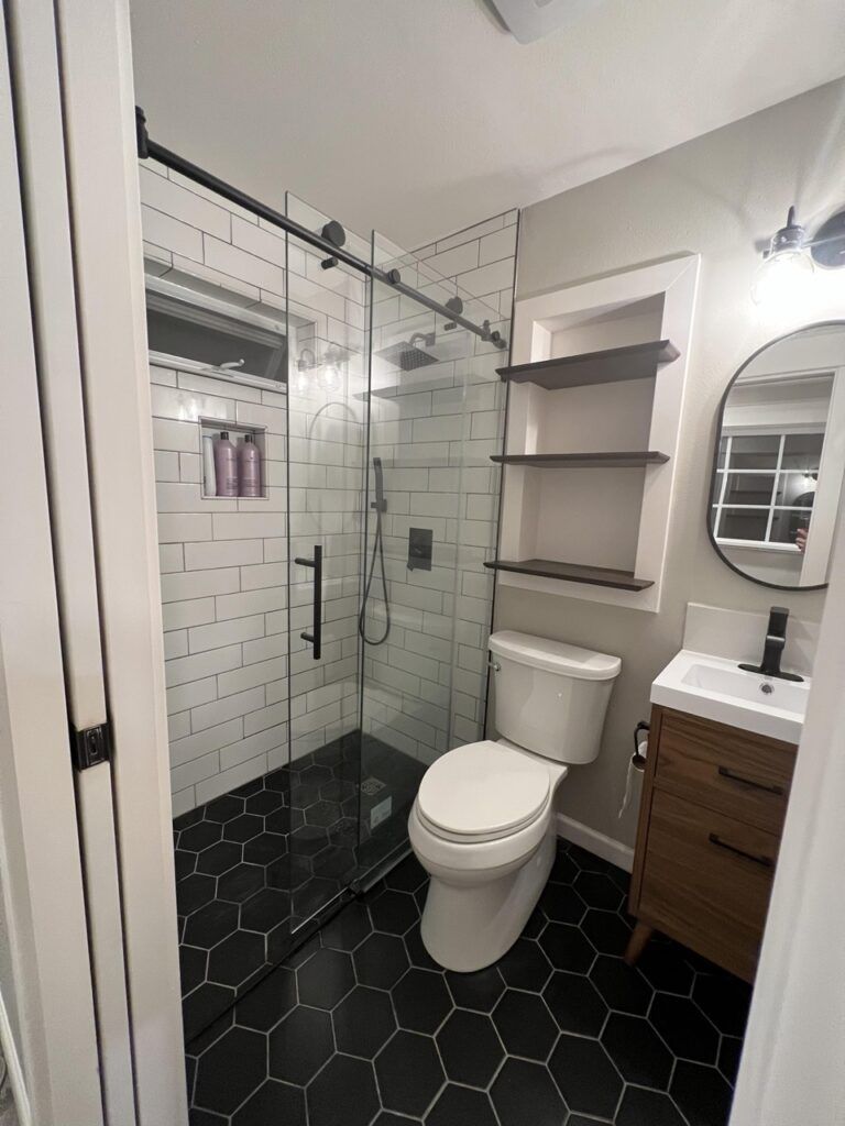 Tile Bathroom Remodel with Glass Barn Door